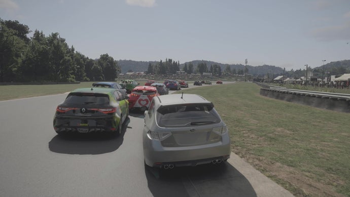 Forza Motorsport screenshot, showing a stream of cars slowing as they round a bend, with trees in the background.