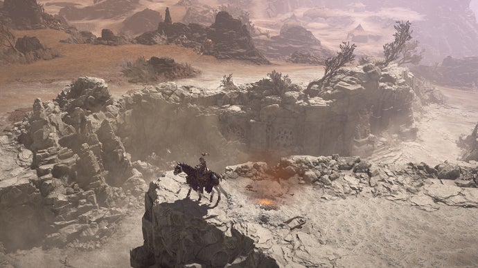 A warrior on horseback explores Diablo 4's landscapes.
