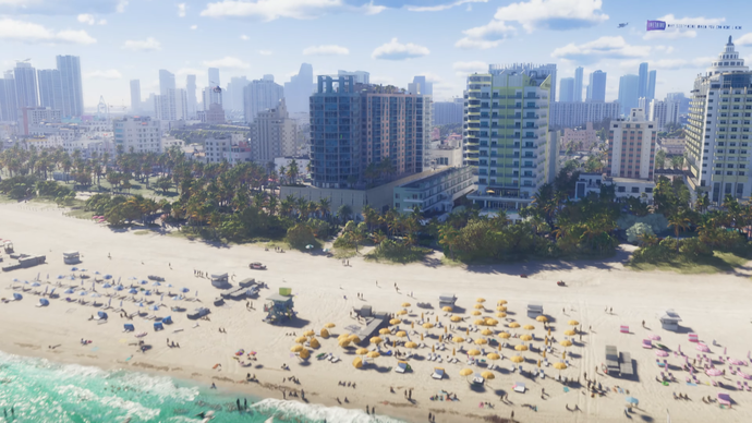 An aerial shot of the Vice City beachfront showing sunbathers tanning themselves in front of skyscrapers, as a plane flies above.