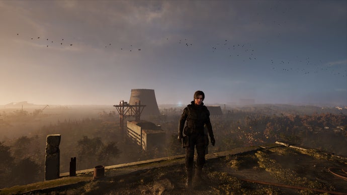 A masculine character stands facing the viewer, on top of a tall building overlooking what appears to be the Chernobyl power plant.