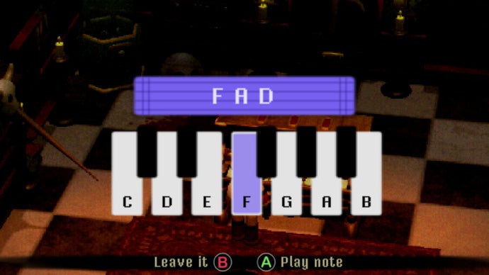 A stylised keyboard is on the screen, showing the letters C D E F G A B. F A D is shown above the keyboard.