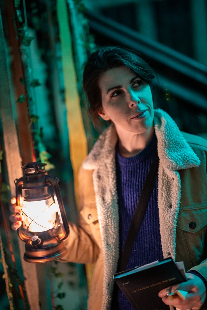 Key of Dreams photo showing a guest holding a lantern.