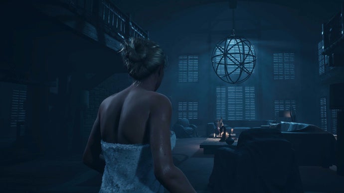 Until Dawn PS5 screenshot showing a blond female walking through a dark house in a towel