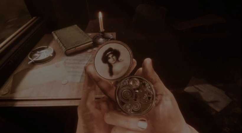 A screenshot of Maid of Sker where the main character is looking at a music box/locket