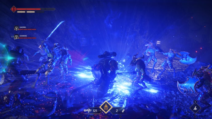 A screenshot of Warhammer 40,000: Space Marine 2, showing Titus slamming his Thunder Hammer down on a group of Tzeentch warriors.