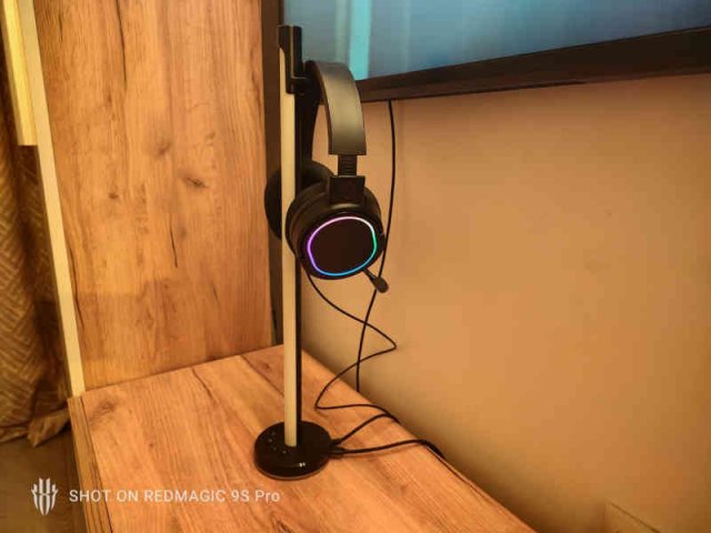 STEALTH LED Panther Headset hanging on a stand