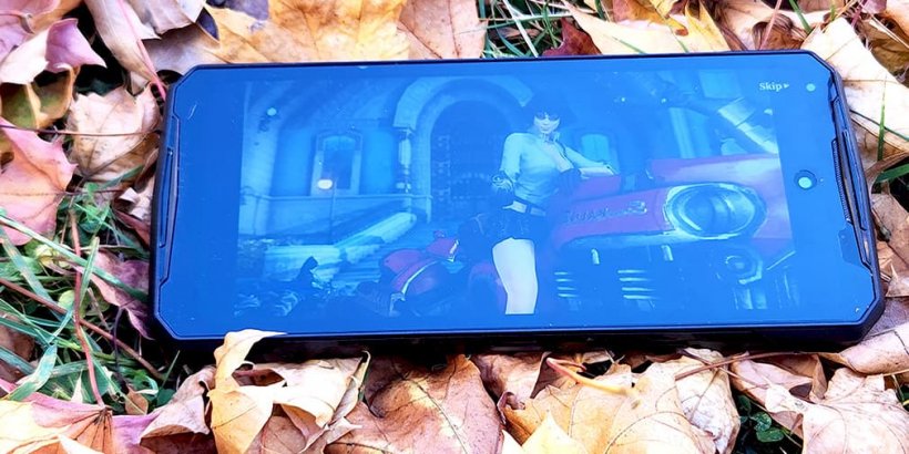 V40 Pro laying in leaf-covered grass with a cutscene with Lady on a motorcycle from Devil May Cry Peak of Combat on screen