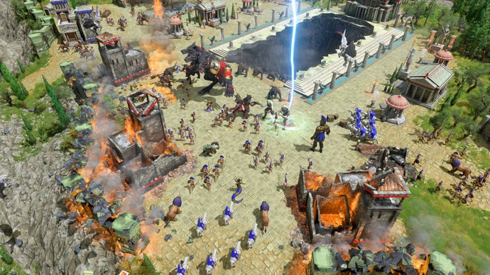 Age of Mythology: Retold official screenshot showing two Greek armies facing off amongst god powers and burning buildings