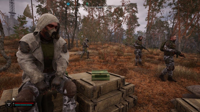 A patrol of Noontide soldiers passes another of their group who is resting on a crate in Stalker 2: Heart of Chornobyl.