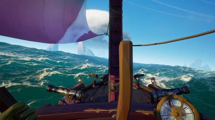 A view of the sea from the captain's wheel of a ship in Sea of Thieves.