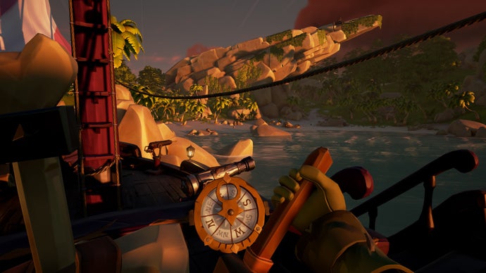 A sailor pulls their boat up to the shore of a quiet island while looking at the compass on their captain's wheel in Sea of Theives.