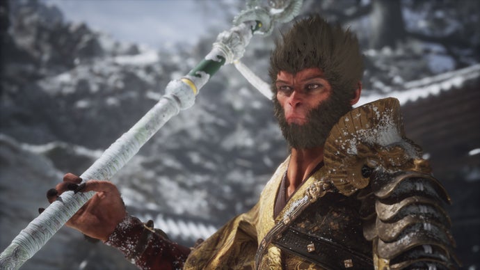 A monkey warrior holds his staff in a snowy scene in Black Myth Wukong