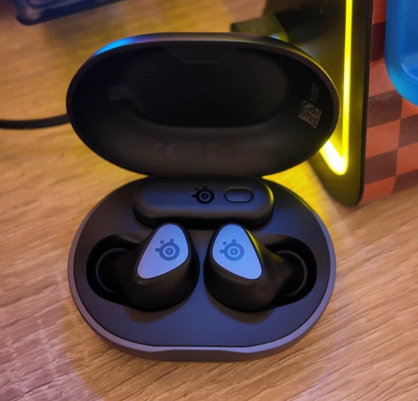 gaming earbuds with the case open