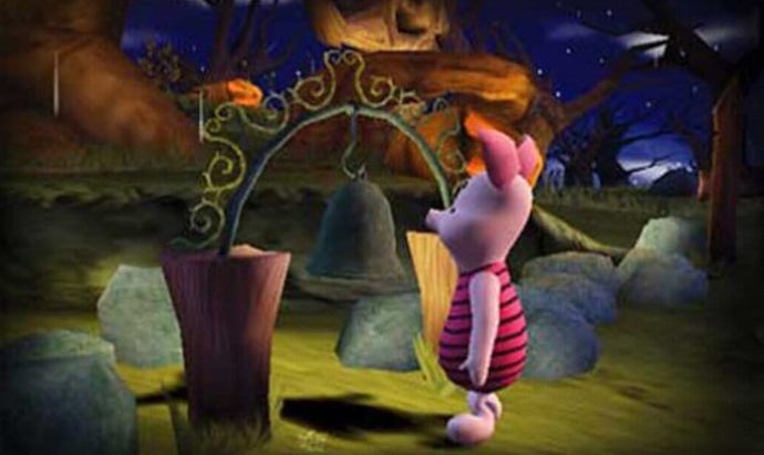 Piglet stands to the left of a bell in a haunted wood