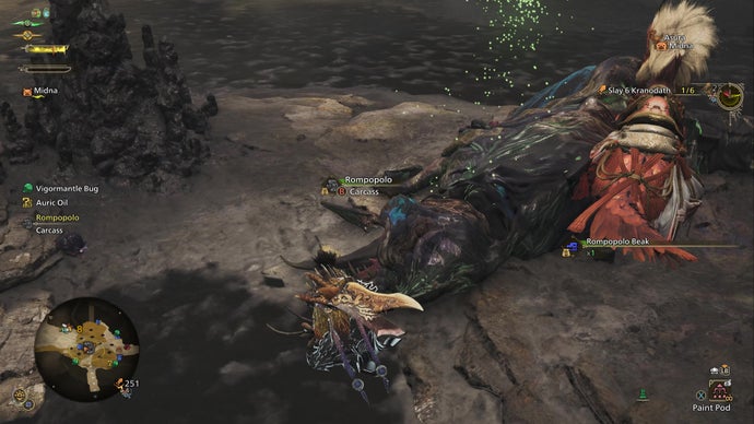 A hunter carves pieces off a Rompopolo in Monster Hunter Wilds.