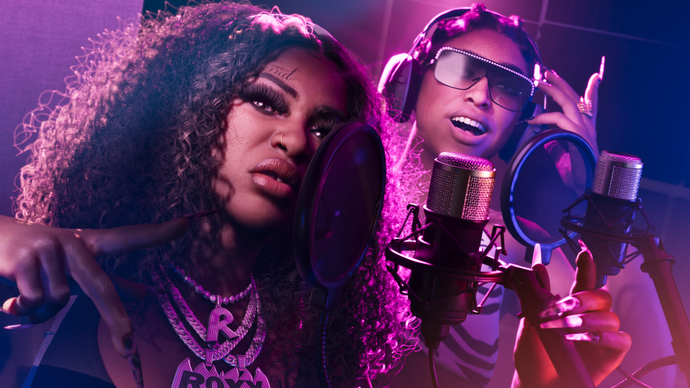 Close up of Real Dimez from GTA 6, two Black female rappers at mics