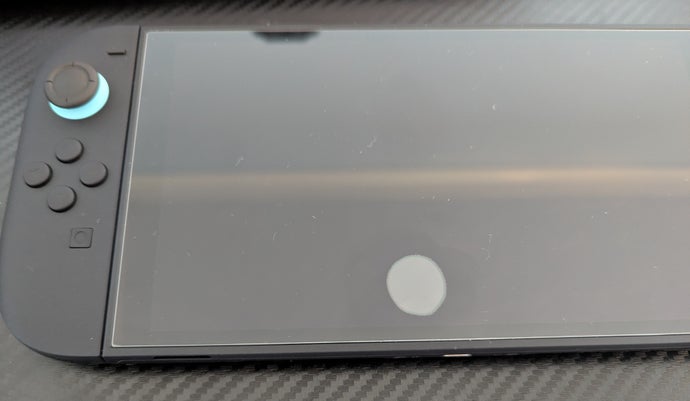 A Switch 2 with a screen protector issue.