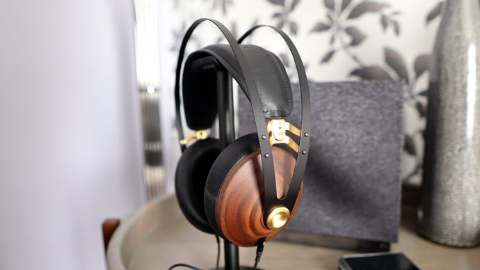 Meze 99 Classic headphones on a stand