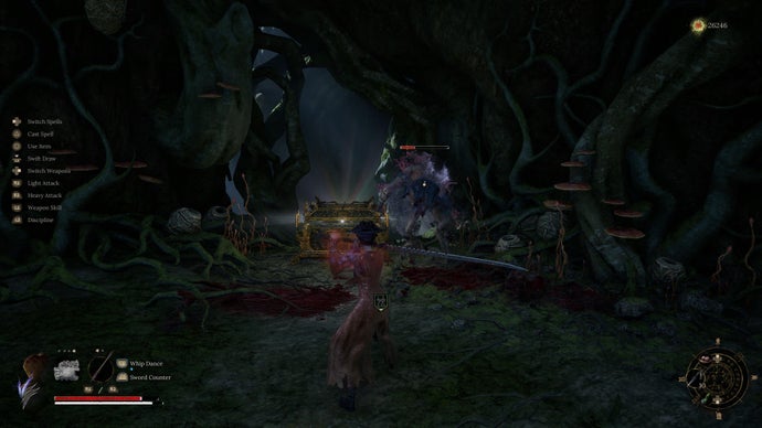 Wuchang locks on to an enemy in the middle of a dark green forest while a gold treasure chest waits on the side, in a screenshot from Wuchang: Fallen Feathers.