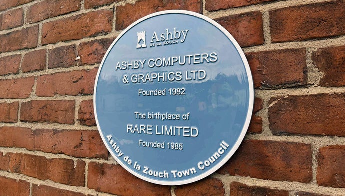A blue heritage plaque marking the birthplace of Rare.