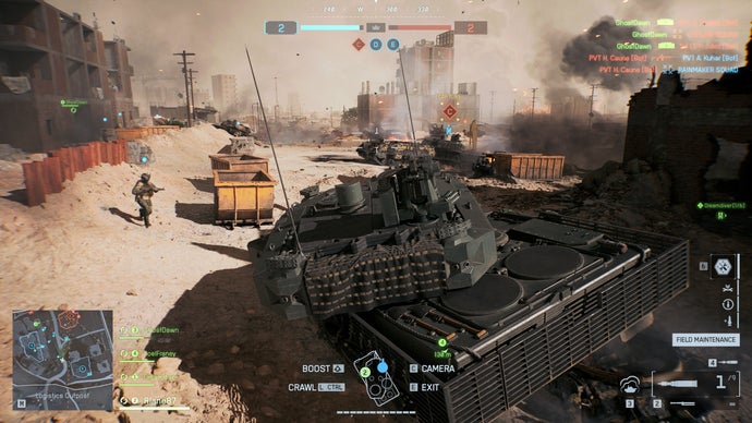A screenshot of Battlefield 6, showing the player driving a tank through a sandy construction site lined with skips.
