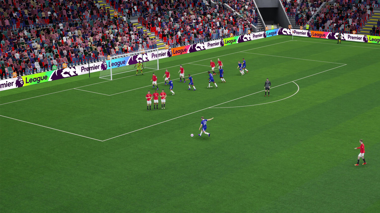 FM26 official screenshot showing Manchester United defending a free kick vs Chelsea