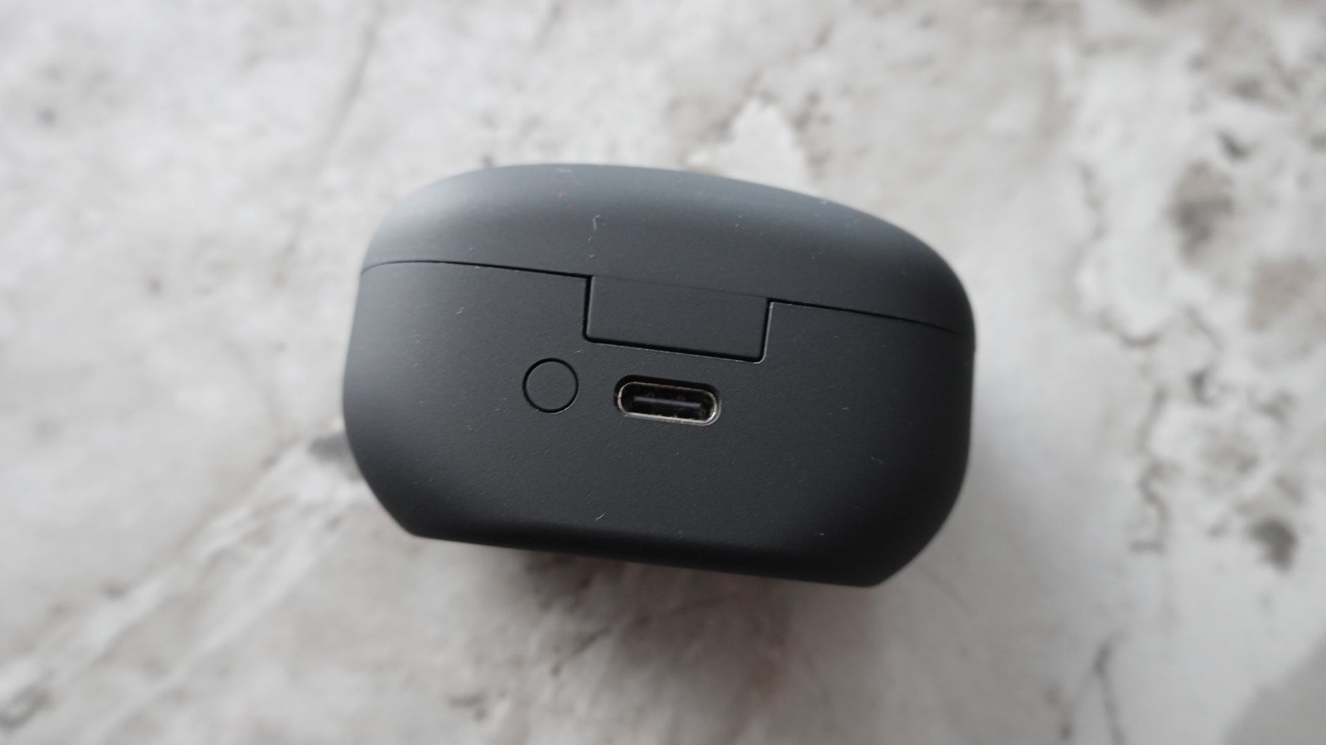 The Sony WF-1000XM5 case with USB-C port on view