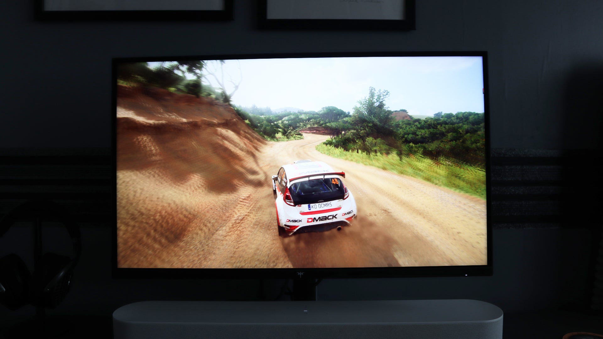 KTC M27P6 gaming monitor screen closeup showing Dirt Rally 2.0